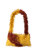 Nina copper and gold top handle bag by Sac de Soul, front view showcasing elegant metallic finish and structured design.
