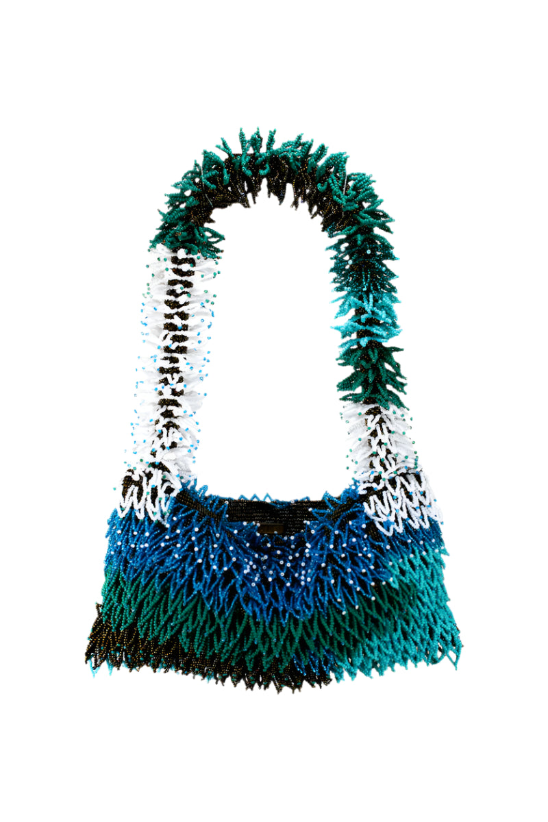 SAC DE SOUL Nina green, blue, and white top handle bag with a structured design and elegant leather finish.