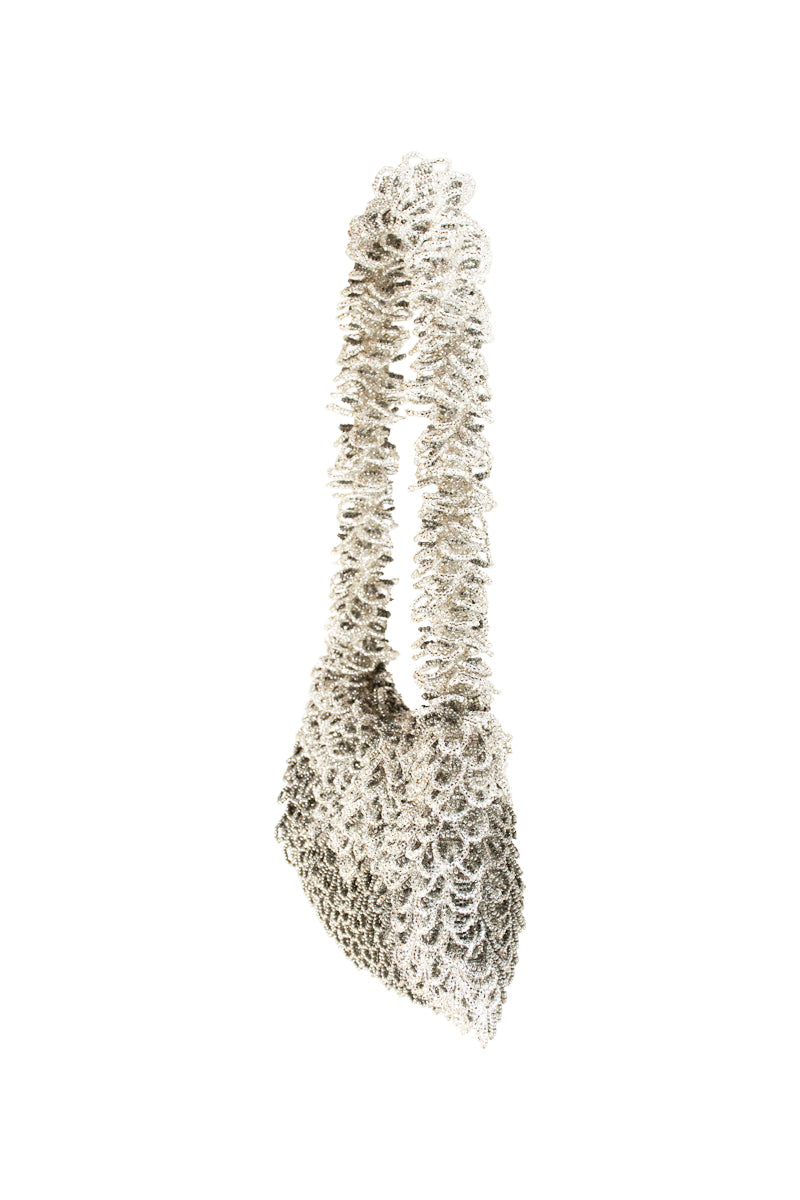 Silver and grey top handle bag by SAC DE SOUL featuring a sleek design with dual handles and a structured shape.