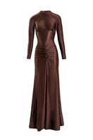 Brown Nocturne gown by Yassmin Saleh featuring elegant design and flowing fabric, front view of the stylish evening dress.
