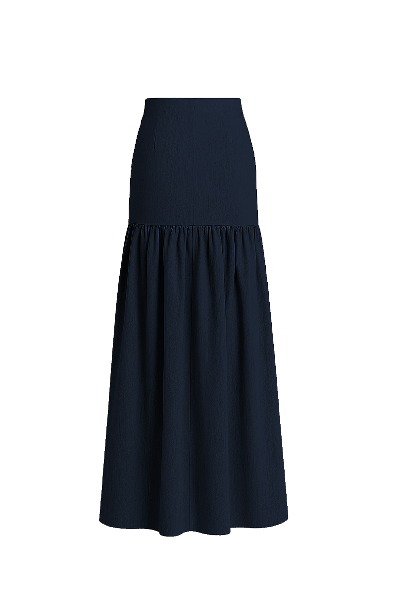 Navy blue maxi skirt from ANA + MARIA, featuring flowing fabric and a stylish silhouette.