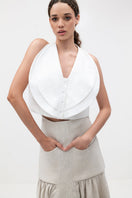 ANA + MARIA Noelle Maxi Skirt in Sand, flowing fabric and ankle-length design, shown in a natural sand color.