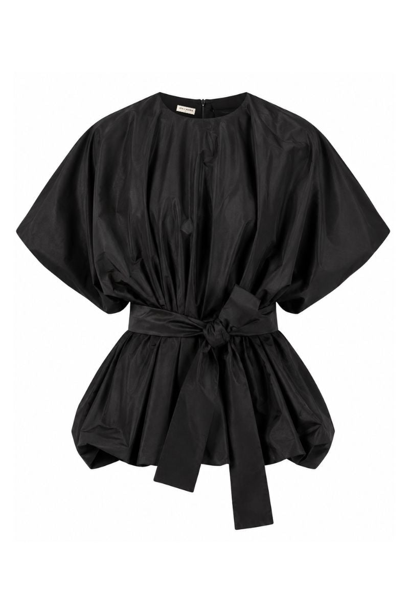 Black Nonora blouse by ANA + MARIA displayed on a ghost mannequin, showcasing the stylish top's fit and fabric details.
