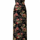 Elegant black gown by Nihan Peker featuring a flowing silhouette and intricate details, perfect for formal occasions.