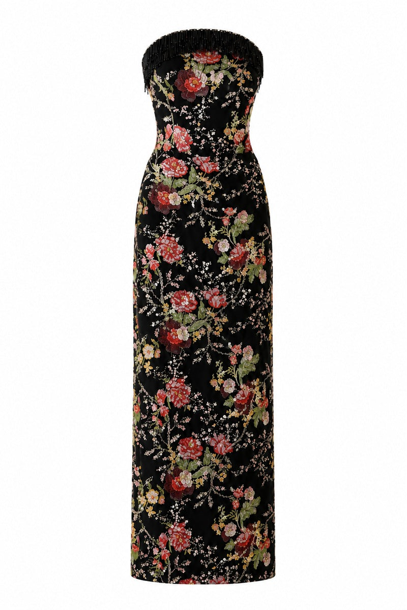 Elegant black gown by Nihan Peker featuring a flowing silhouette and intricate details, perfect for formal occasions.