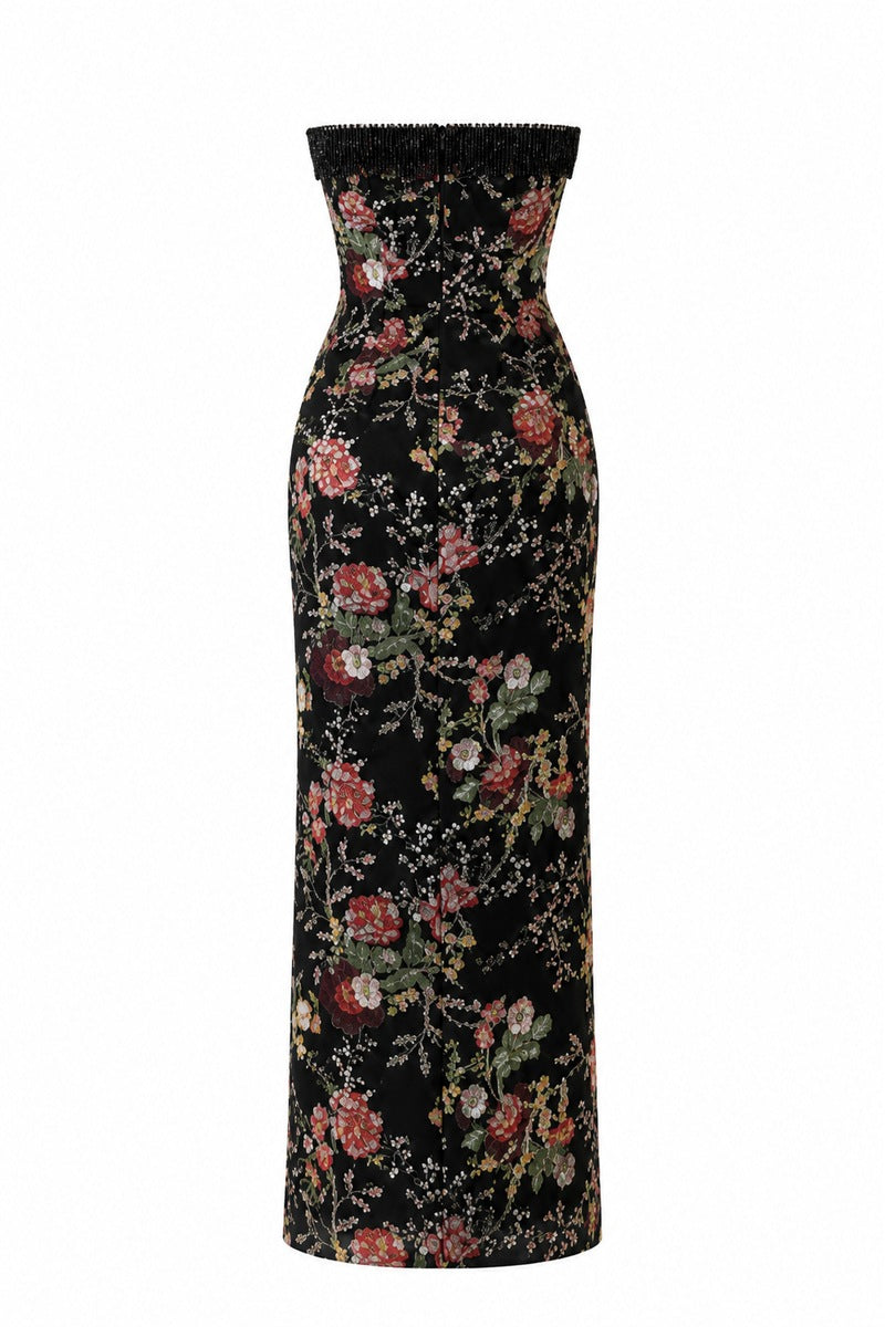 Elegant black gown by Nihan Peker with flowing fabric and intricate detailing, perfect for formal occasions.