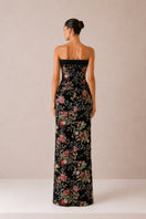 Black Nihan Peker gown from the Novias dress collection, featuring elegant fabric and detailed design for formal occasions.