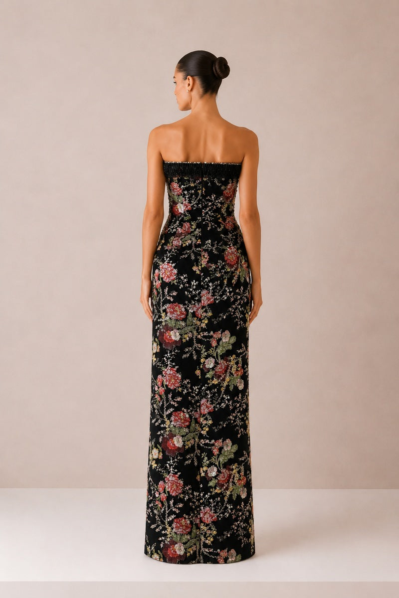 Black Nihan Peker gown from the Novias dress collection, featuring elegant fabric and detailed design for formal occasions.