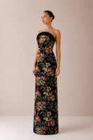 Elegant black Nihan Peker gown with flowing fabric and intricate detailing, perfect for formal occasions.