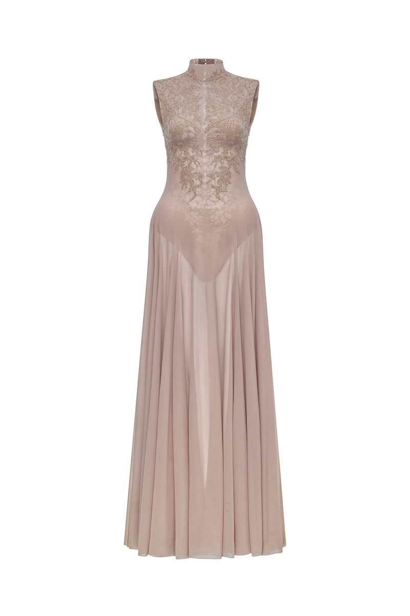 Nude sleeveless jacquard maxi dress by Montsand featuring a flowing silhouette and intricate fabric pattern.