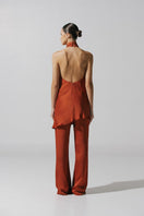 Baobab Numa pants in terracotta, stylish and comfortable, featuring a relaxed fit and earthy color, perfect for casual wear.