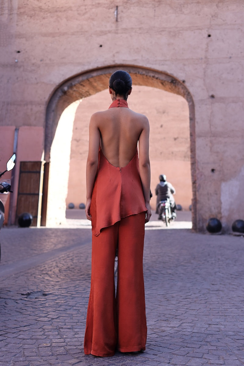 Baobab Numa Top in terracotta, stylish sleeveless blouse with a relaxed fit, showcasing warm earthy tone fabric.
