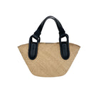 Black Nuqui basket top handle bag by ISIDORA MALVA featuring a woven design and sturdy black handle.
