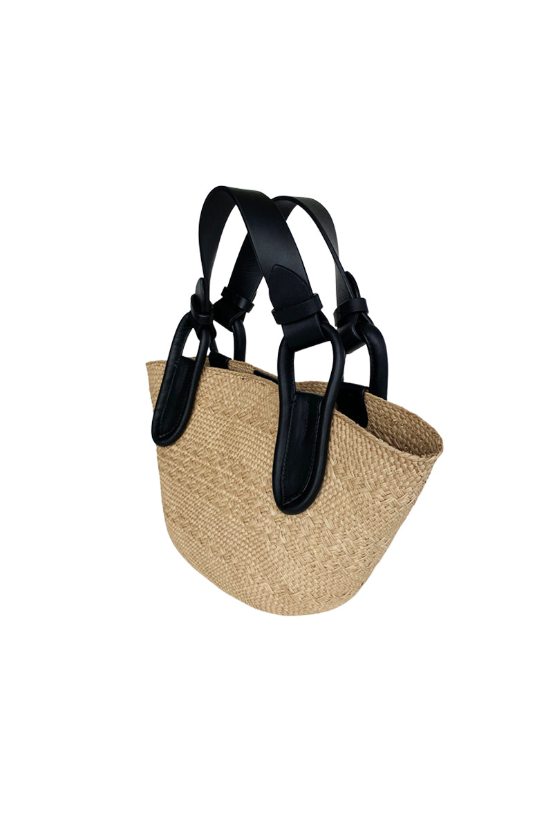 Black ISIDORA MALVA Nuqui basket with top handle, woven design, and spacious interior for stylish everyday use.