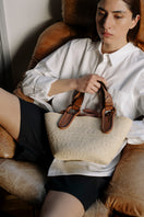 ISIDORA MALVA Nuqui beach basket in tan with top handle, woven design, perfect for casual or beach outings.