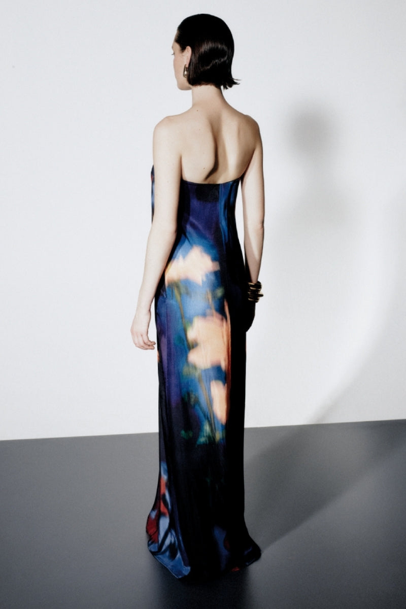 Back view of SISTERS Nyra Maxi Dress in Amber Sky, flowing maxi dress with a relaxed fit and soft fabric.