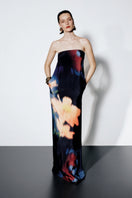Sisters Nyra maxi dress in amber sky color, flowing fabric with a flattering fit, shown from the front.
