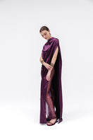 Studio NK aubergine OBSCURA Cape, a stylish and flowy top with a rich purple color, displayed on a hanger.