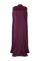 Studio NK aubergine Obscura Cape, a stylish top in rich purple, shown hanging flat with detailed fabric texture.
