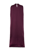 Studio NK Obscura cape in aubergine, a stylish tops piece with a flowing design and rich purple color, shown on a model.