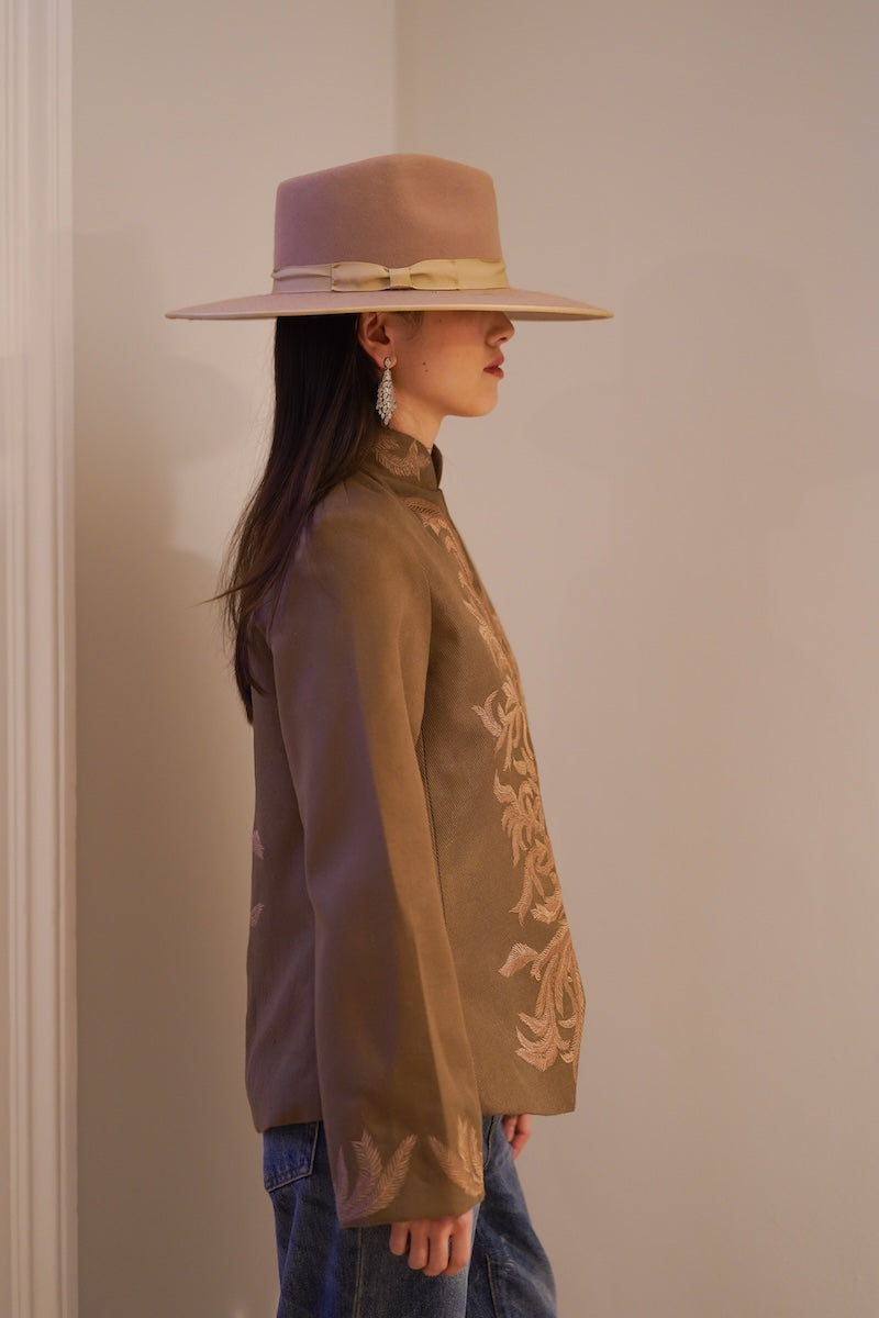 Nadya Shah Odessa jacket featuring a stylish, tailored design with a front zipper and collar, displayed on a neutral background.