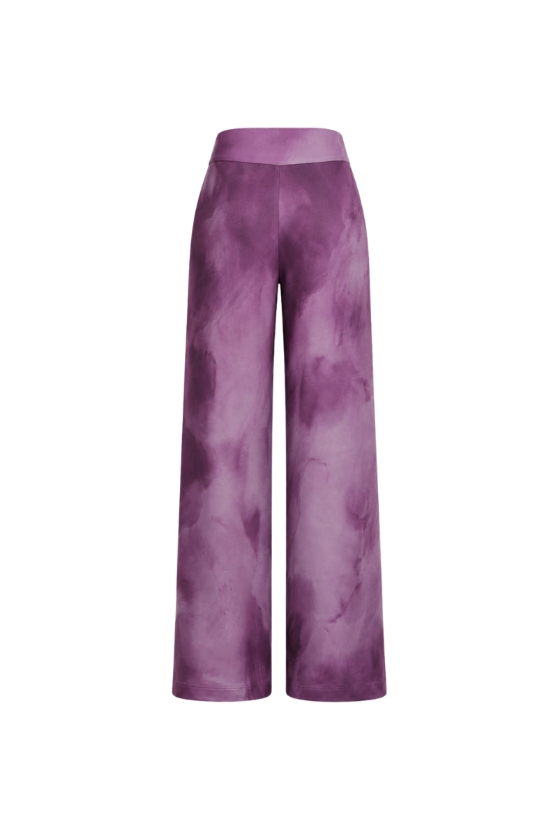 Tinta Latina Olivo pants in purple print, showcasing stylish patterned pants with a relaxed fit and vibrant design.