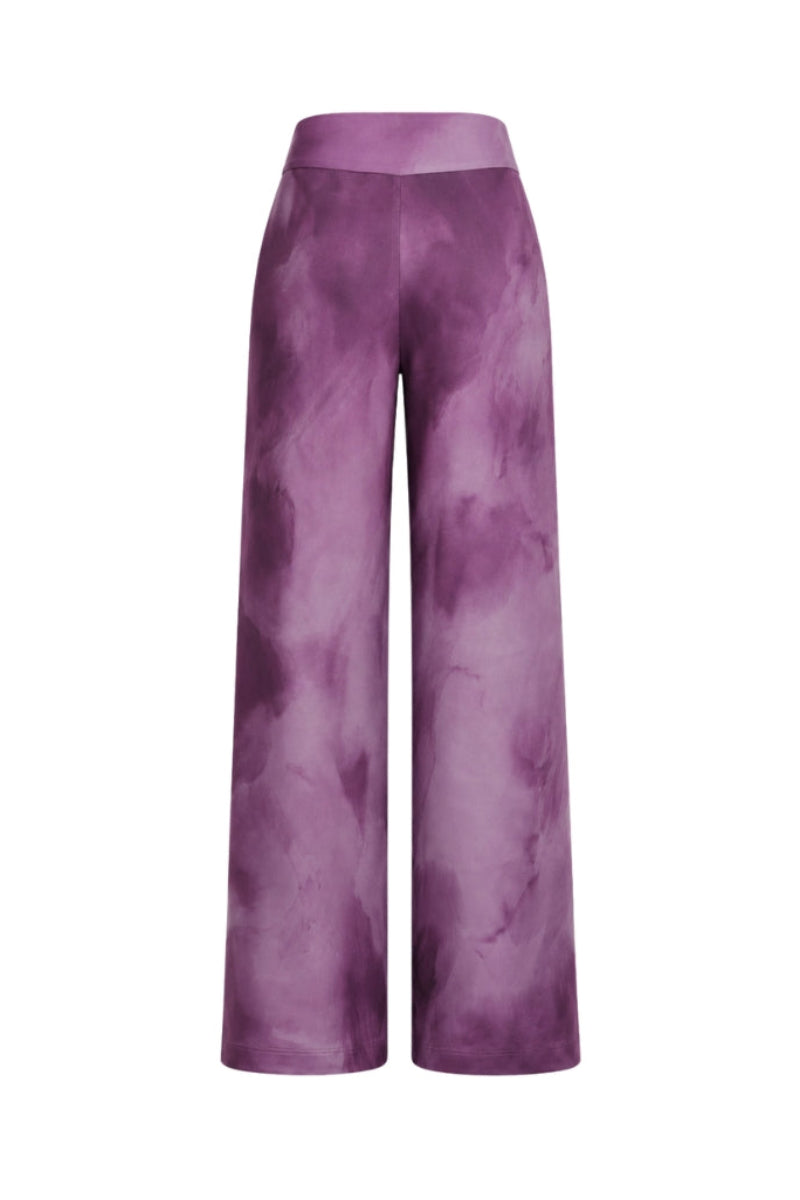 Tinta Latina Olivo pants in purple print, showcasing stylish patterned pants with a relaxed fit and vibrant design.
