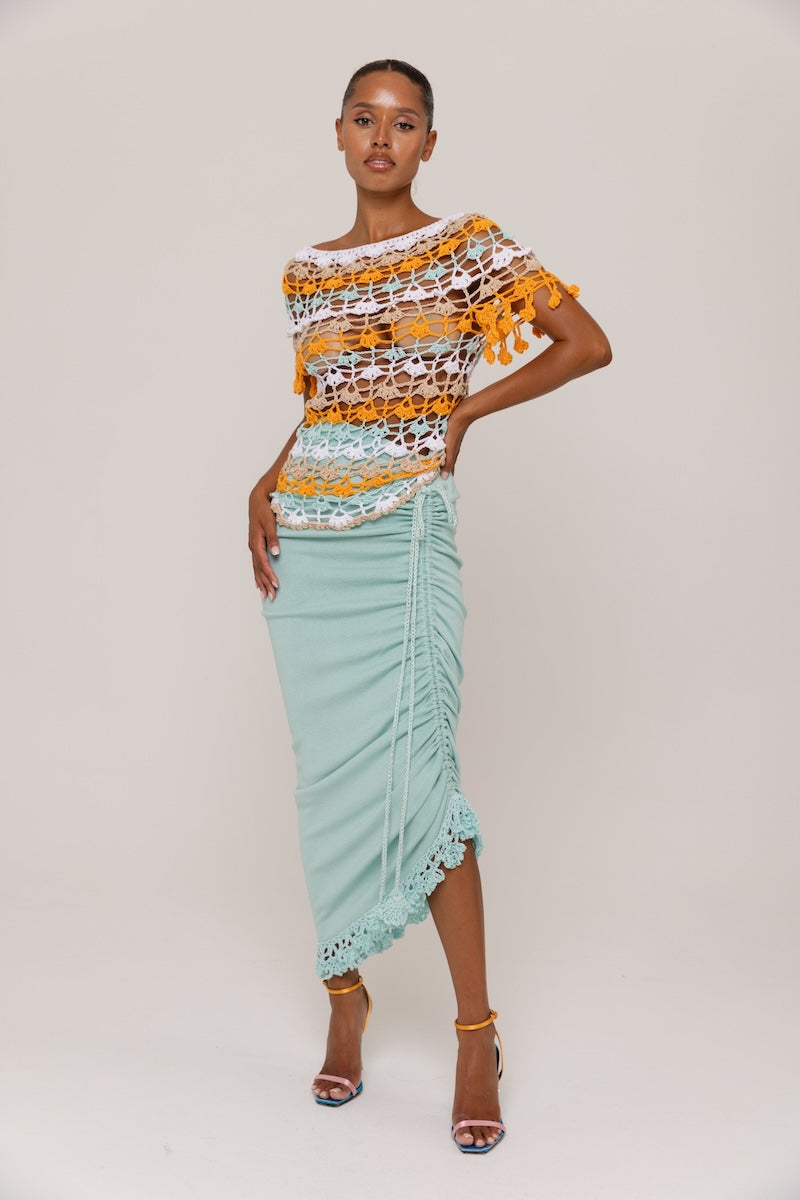 Mint carnation knit midi skirt with handmade embroidery from Andreeva, featuring intricate floral details and a soft, textured fabric.