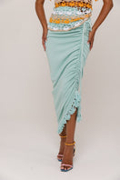 Mint carnation knit midi skirt with handmade embroidery from Andreeva, featuring intricate floral details on soft, textured fabric.