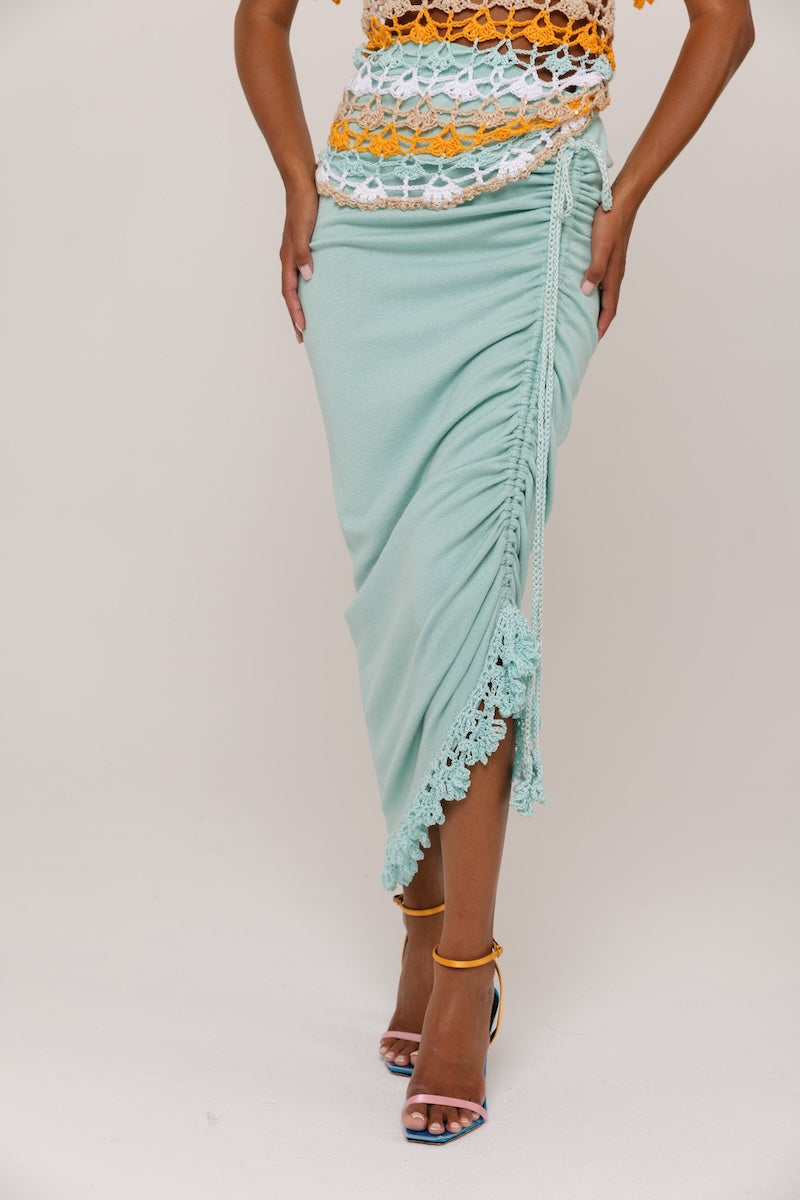 Mint carnation knit midi skirt with handmade embroidery from Andreeva, featuring intricate floral details on soft, textured fabric.