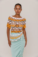 Handmade crochet top by Andreeva in vibrant orange and blue, featuring intricate patterns and a stylish, bohemian design.