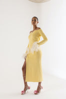 Yellow vanilla knit midi skirt with feather accents from Andreeva, featuring a soft, textured fabric and stylish feather detailing.