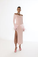 Pink vanilla knit midi skirt with feather accents from Andreeva, featuring a soft, textured fabric and stylish design.