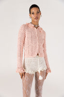 White handmade crochet chrysanthemum shorts by Andreeva featuring intricate floral patterns and a comfortable fit.