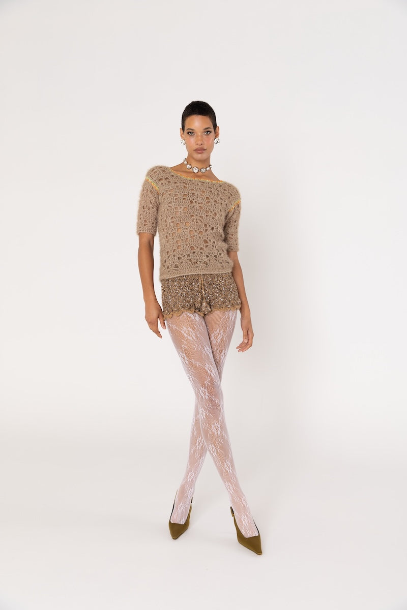 Brown handmade crochet shorts by Andreeva featuring intricate detailing and a comfortable fit, perfect for casual wear.