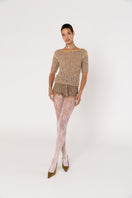 Handmade brown crochet chrysanthemum shorts by Andreeva, showcasing intricate crochet patterns and a relaxed fit.