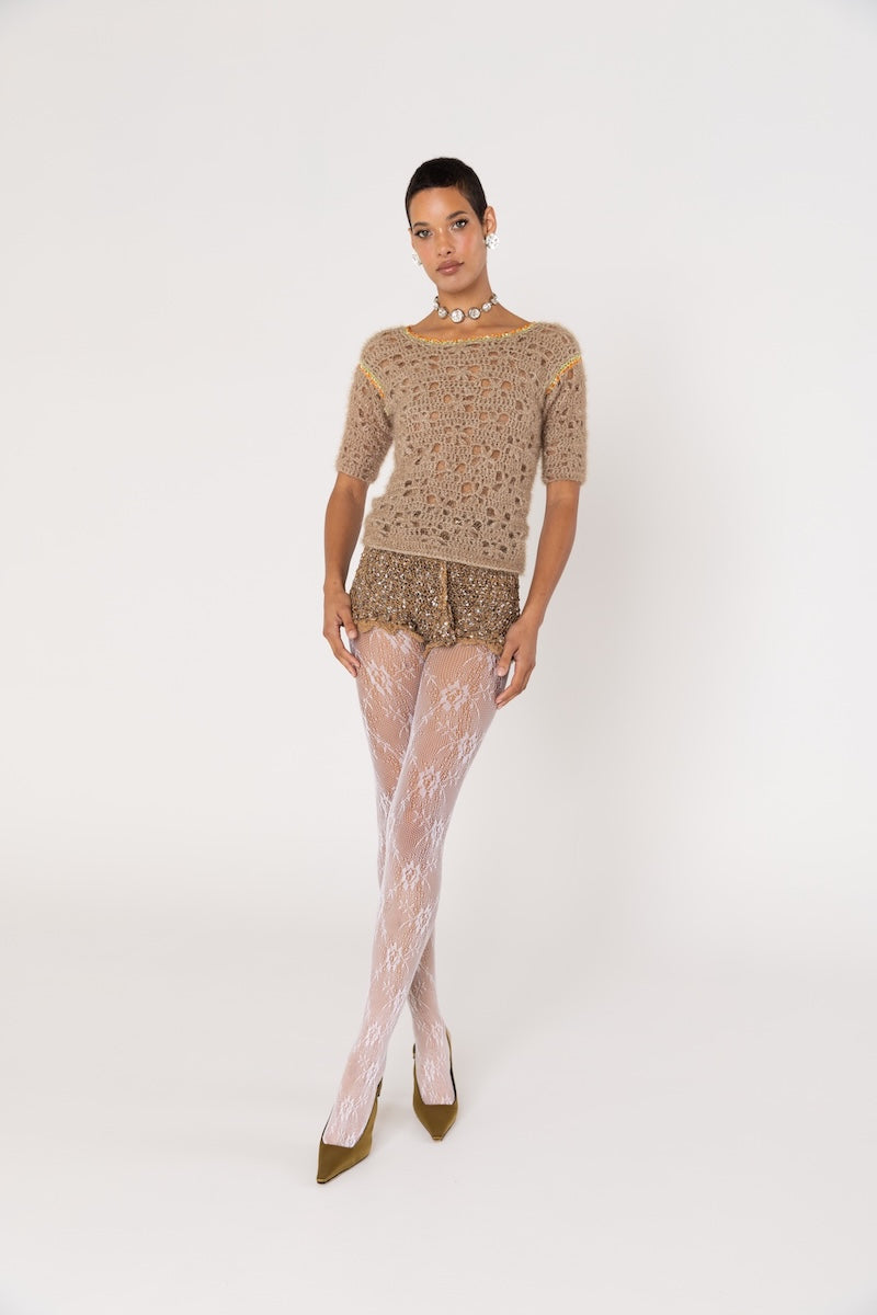 Handmade brown crochet chrysanthemum shorts by Andreeva, showcasing intricate crochet patterns and a relaxed fit.