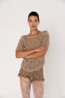Brown handmade crochet shorts by Andreeva featuring intricate crochet patterns and a comfortable, stylish fit.