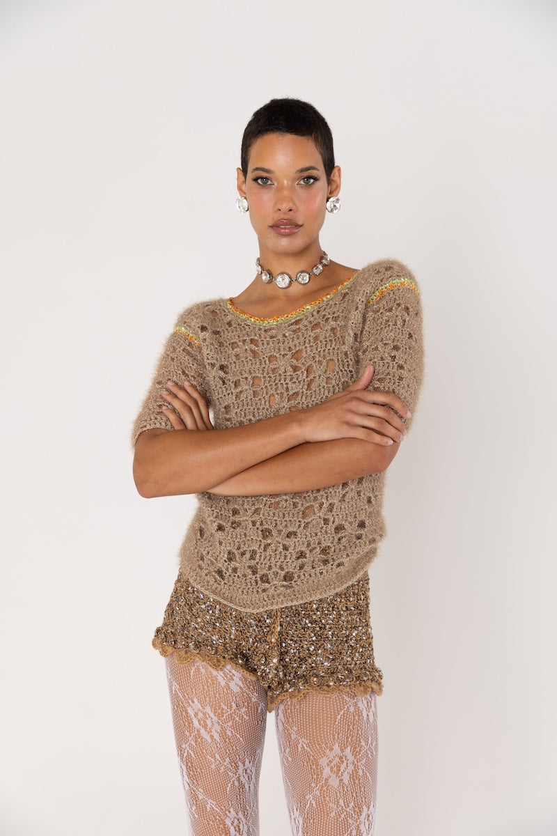 Brown handmade crochet shorts by Andreeva featuring intricate crochet patterns and a comfortable, stylish fit.