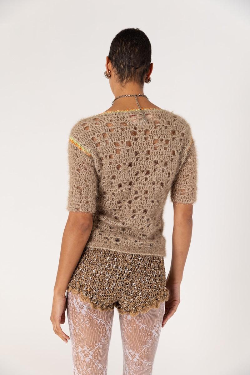 Brown handmade crochet shorts with chrysanthemum pattern from Andreeva, featuring intricate detailing and a comfortable fit.
