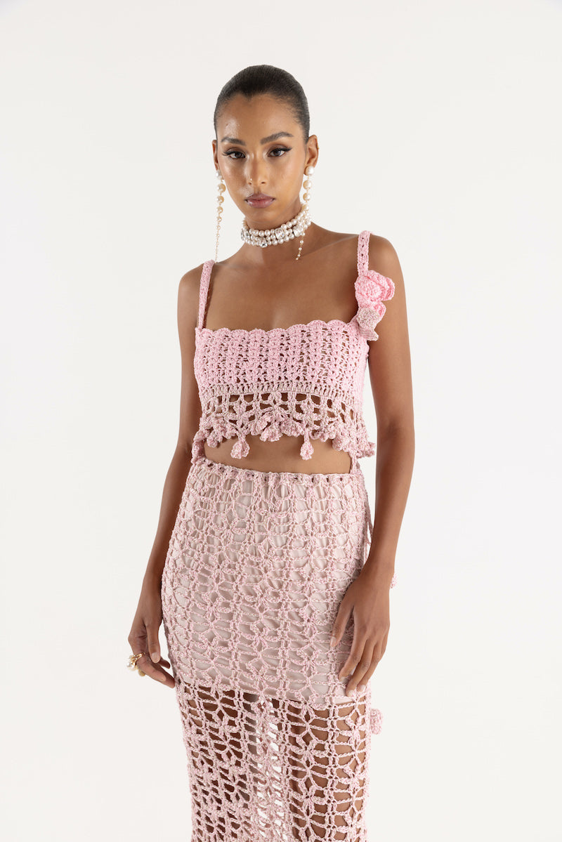 Pink vanilla handmade knit midi skirt by Andreeva, featuring soft texture and stylish design, perfect for casual or dressy outfits.
