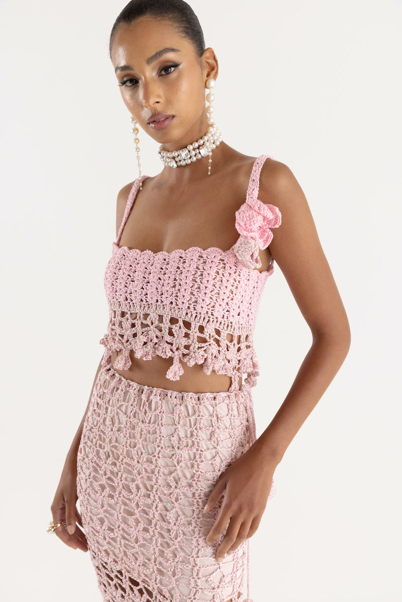 Pink vanilla handmade knit midi skirt by Andreeva, featuring a soft, cozy texture and stylish design.