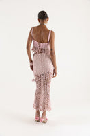 Pink vanilla handmade knit midi skirt by Andreeva, showcasing soft fabric and stylish design on a neutral background.