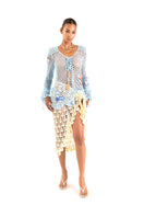 Yellow handmade crochet cover-up by Andreeva, featuring intricate crochet patterns, perfect for beach or poolside wear.