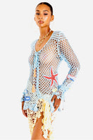 Yellow handmade crochet cover-up by Andreeva featuring intricate crochet details and a relaxed, stylish fit.