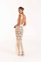 White pearl handmade maxi crochet dress by Andreeva, featuring intricate crochet details and flowing silhouette.
