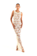 White pearl handmade maxi crochet dress by Andreeva, featuring intricate crochet details and flowing fabric for elegant summer wear.