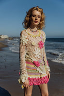 Multicolor handmade crochet mini skirt by Andreeva featuring intricate stitch details and vibrant multicolor pattern.