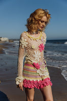 Multicolor handmade mini crochet skirt by Andreeva featuring intricate patterns and vibrant colors.