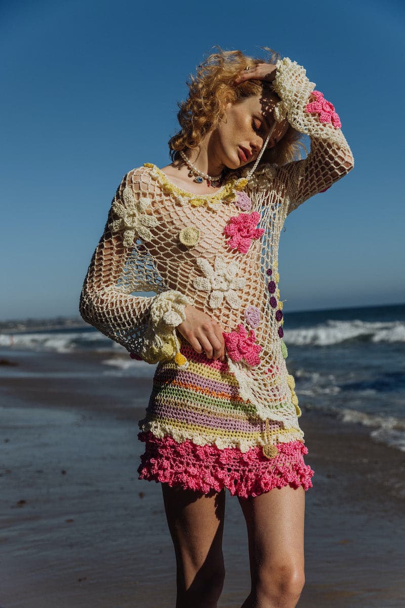 Multicolor handmade crochet mini skirt by Andreeva featuring intricate patterns and a trendy, fitted style.